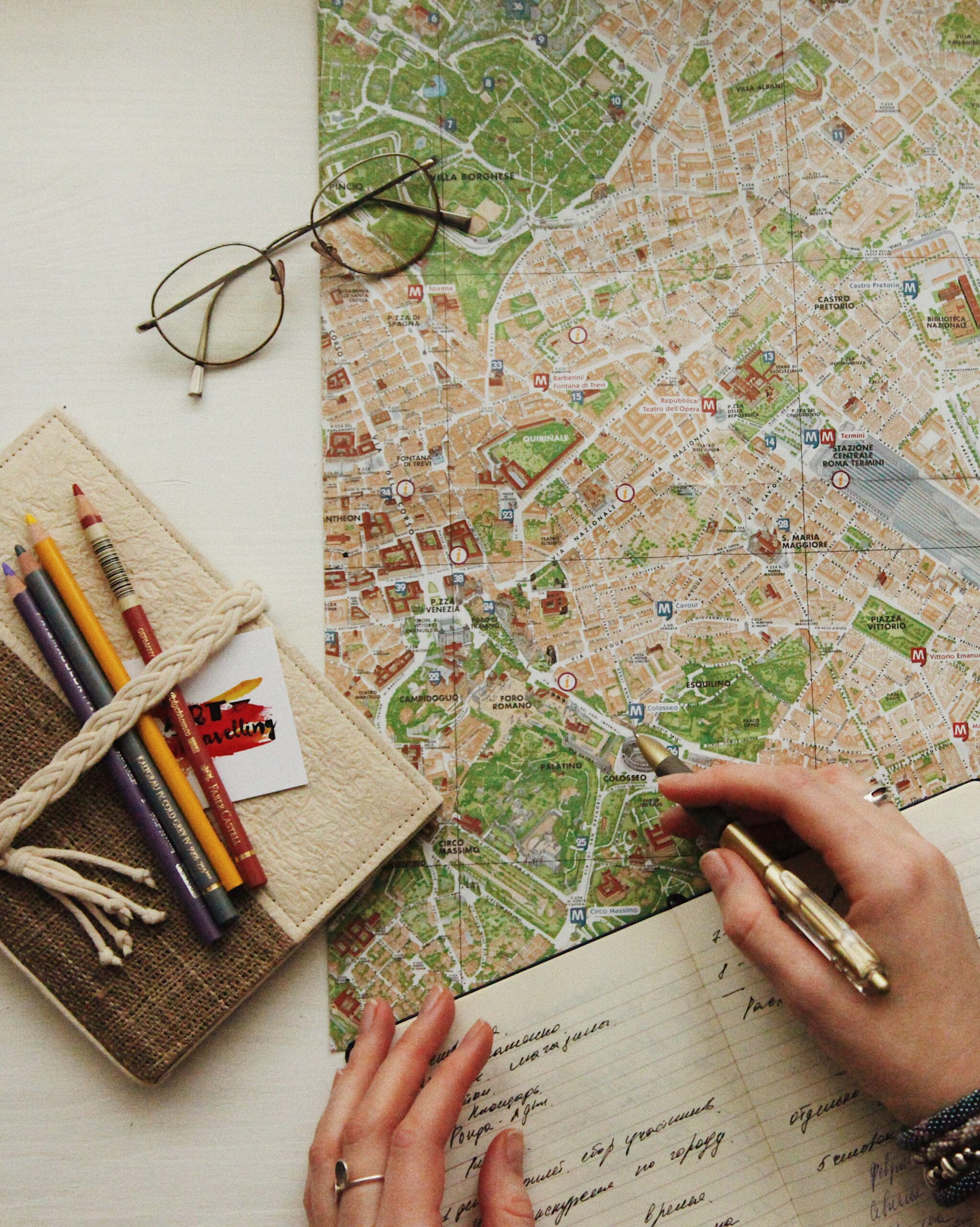 Confident traveler navigating a bustling foreign train station with map