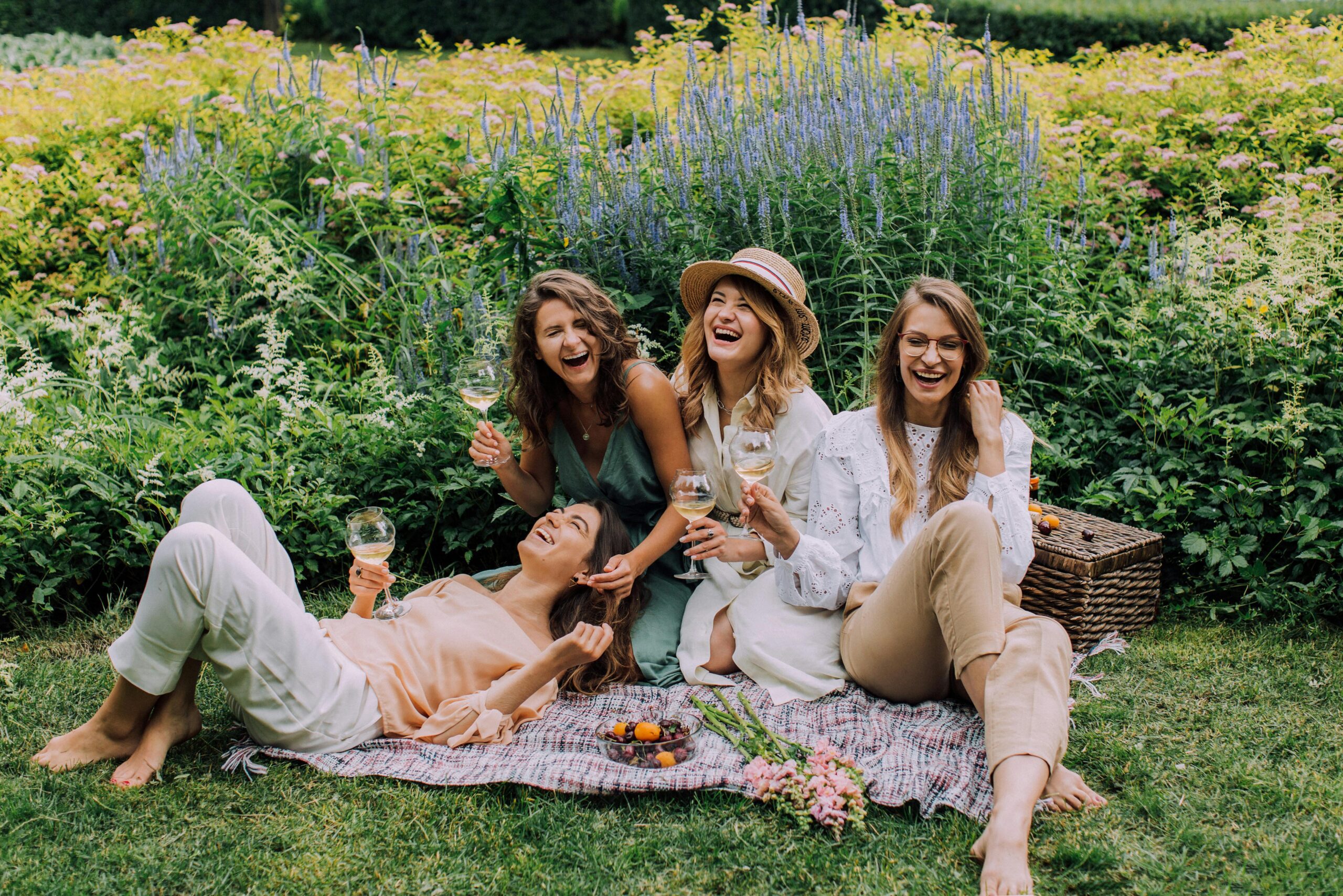 Group of women enjoying a cozy and stylish set-jetting group travel experience