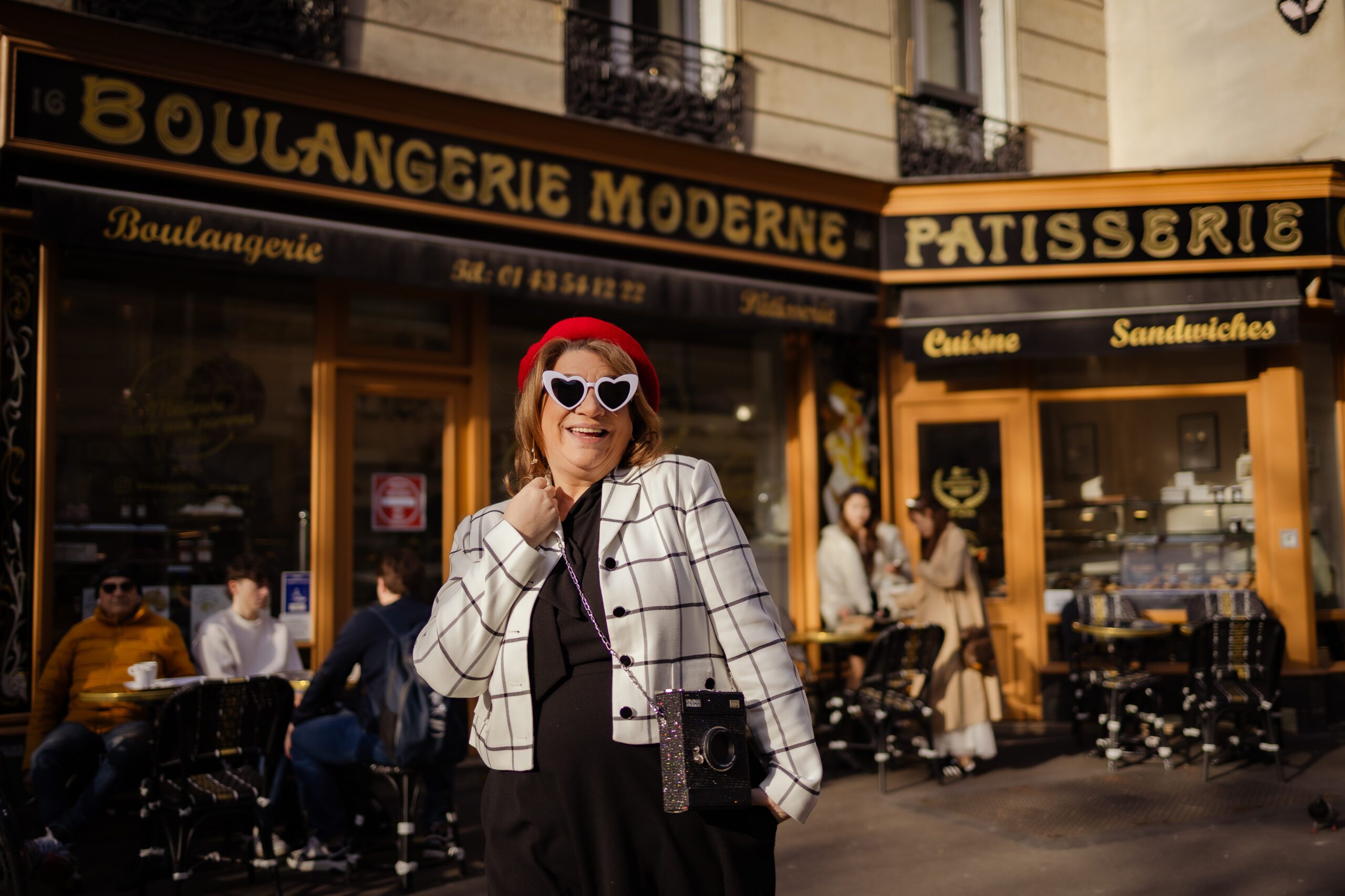 Sunlit Paris street perfect for Emily in Paris set-jetting travel experience
