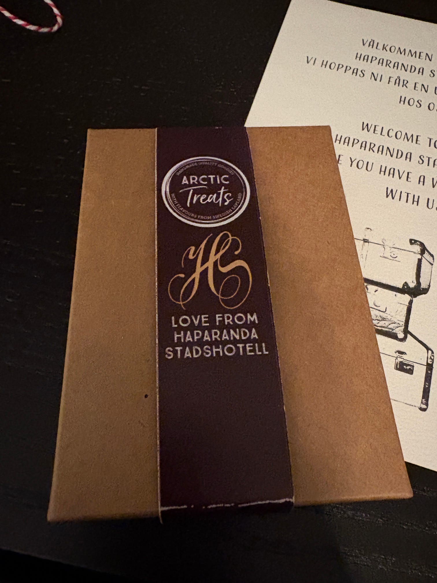 Locally sourced destination gifts including chocolate and artisan goods for a group trip welcome package