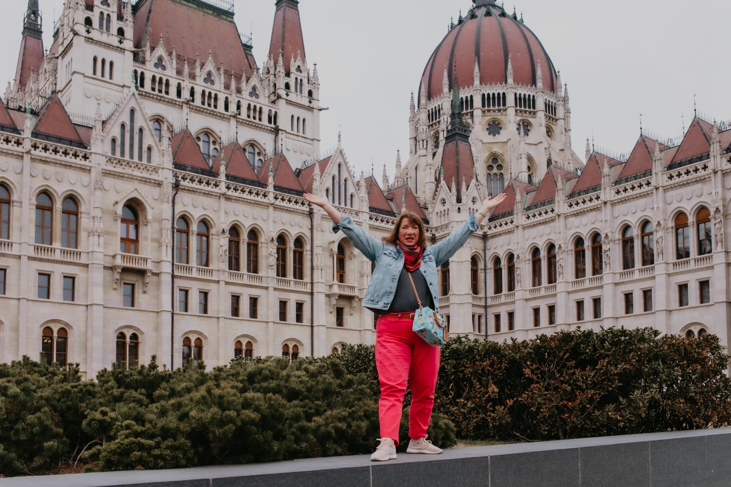 ravel advisor Michele Schwartz in front of the Hungarian Parliament Building in Budapest on a Danube river cruise