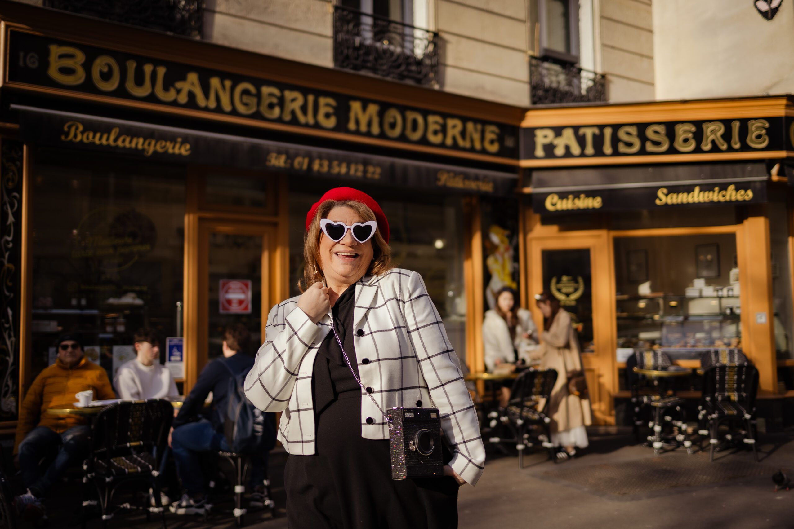 Paris café terrace at golden hour in the style of Emily in Paris filming locations