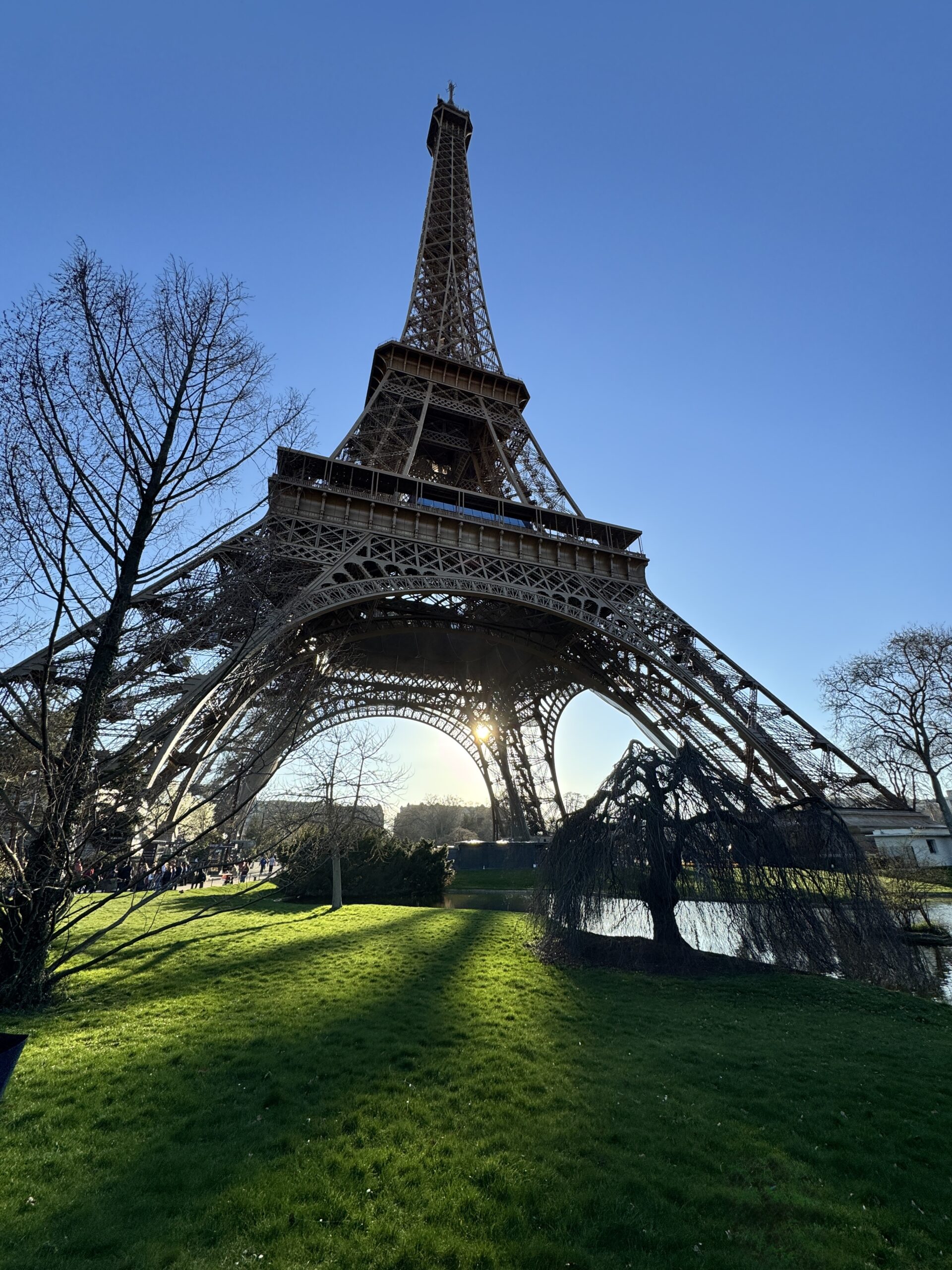 First view of the Eiffel Tower in Paris France from street level