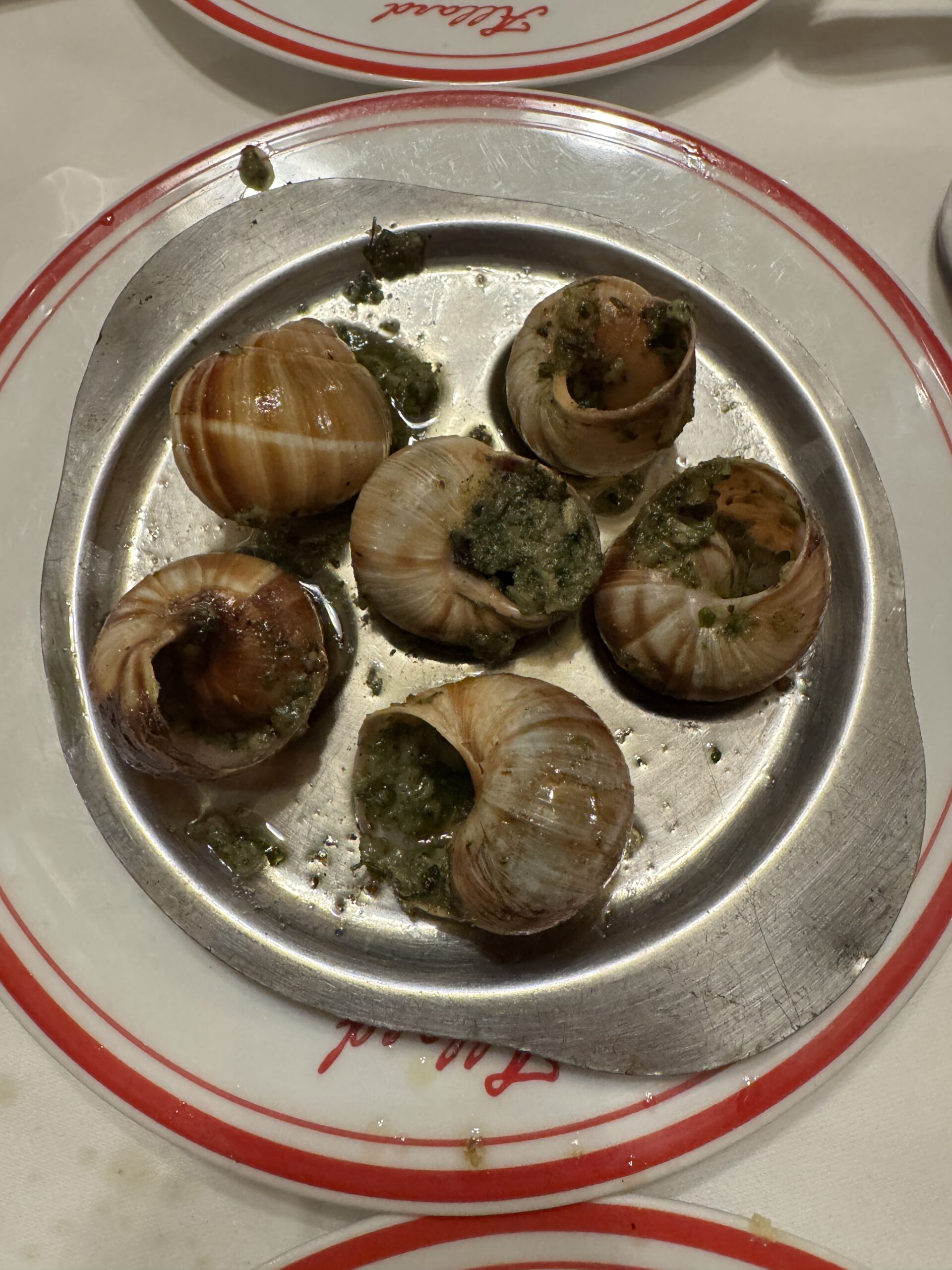 Elegant table setting at a Michelin-starred restaurant dining room in Paris